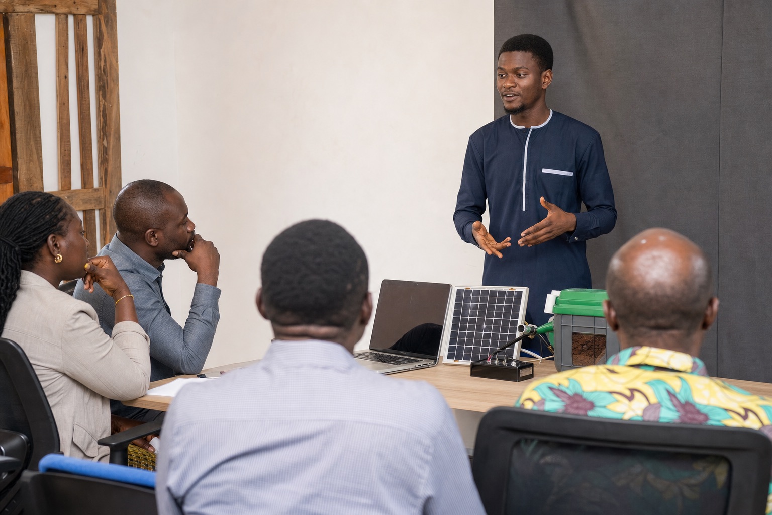Ghanaian agri-startup pitch competition, young entrepreneurs presenting, modern auditorium, Ghana